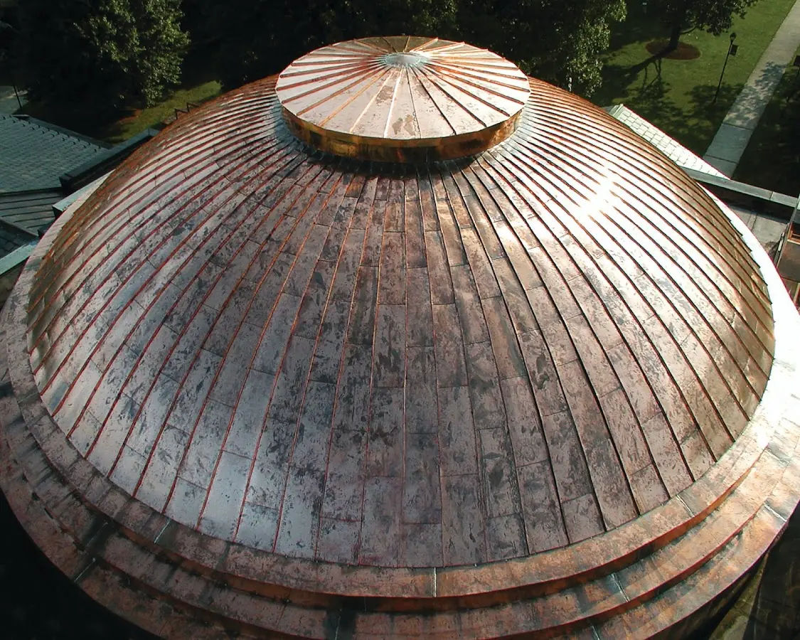 Craftsman Roofing crew installing a new roof in Mad River